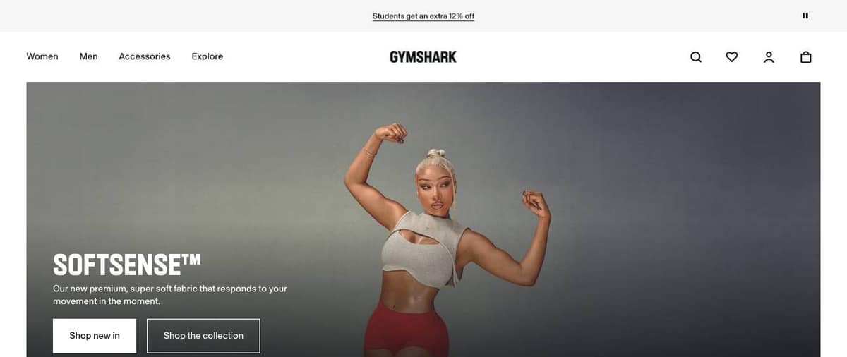 Gymshark homepage on a desktop screen: a product name as the headline, one line about the fabric and two buttons, Shop new in and Shop the collection